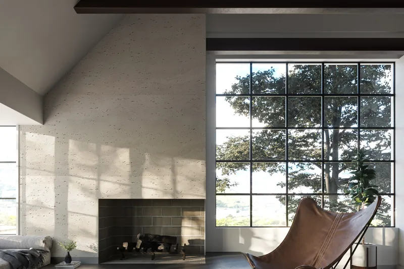 Minimal living room with travertine stone wall cladding in a light beige tone