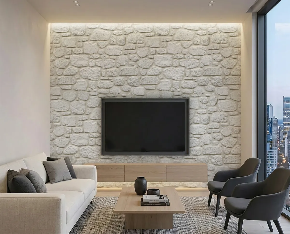 Living room with white stone TV wall and concealed lighting